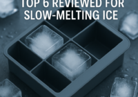 Large clear square ice cubes in a silicone mold on a kitchen counter