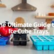 Photo-style image for the article "The Ultimate Guide to Ice Cube Trays: Materials, Shapes and Uses" showing the ultimate guide to ice cube trays